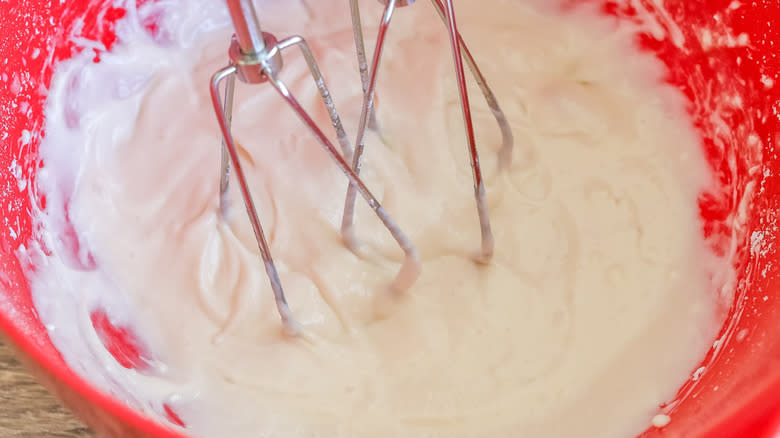 Glaze being beaten in a bowl