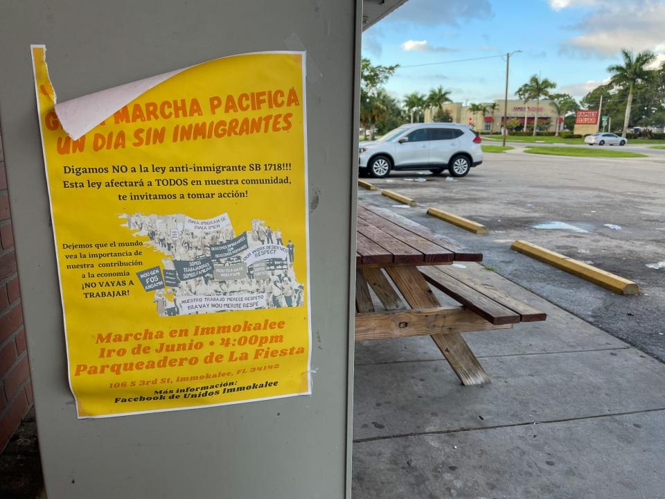 A flyer for a protest against a Florida law that imposes new penalties and restrictions on undocumented immigrants is pasted along an Immokalee, Florida strip mall.