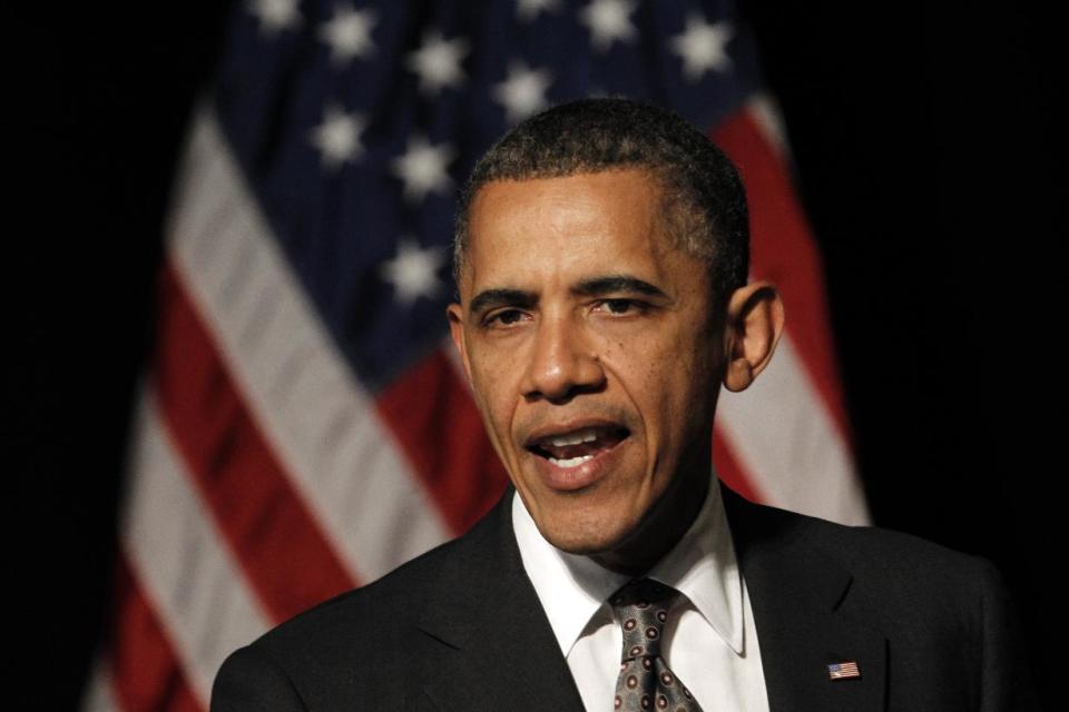 President Barack Obama speaks at a fundraising reception at The Henry Ford in Dearborn, Mich., Wednesday, April 18, 2012. (AP Photo/Paul Sancya)