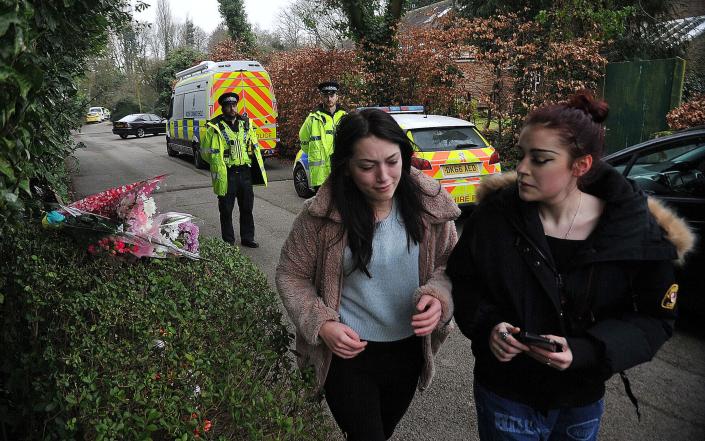 Brianna Gay's friends leave flowers near the scene - CHRIS NEAL