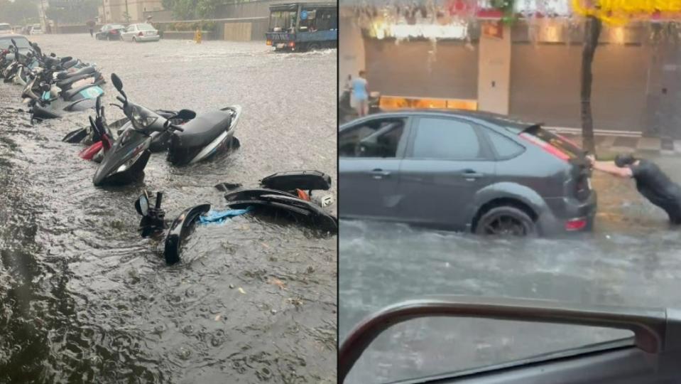 雙北、桃園部分地區出現嚴重積水，導致車輛拋錨，民眾無奈推車。翻攝記者爆料網