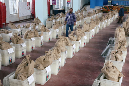 Voting materials including ballot boxes are seen inside a distribution centre ahead of 11th general election which will be held on December 30 in Dhaka, Bangladesh December 29, 2018. REUTERS/Stringer