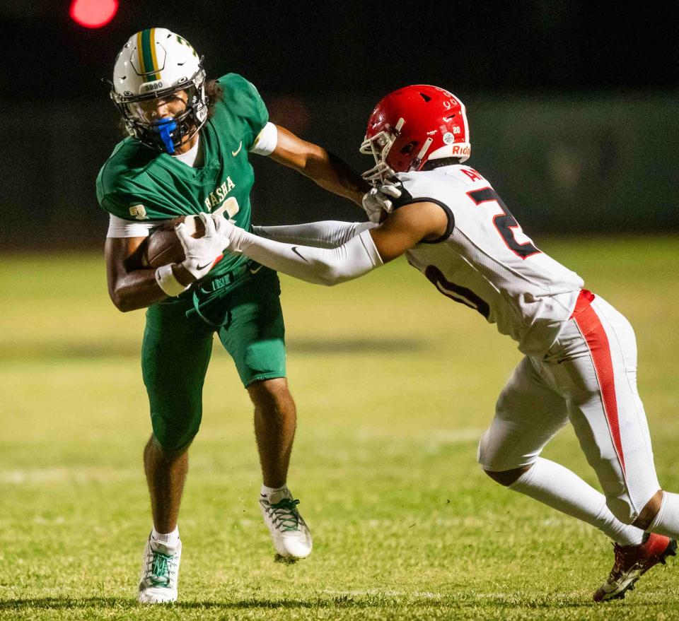 Basha Bears wide receiver Mason Arhin (3) runs with the ball against Brophy Prep Broncos defensive back Cree Thomas (20) at Basha High School's football field in Chandler on Sept. 28, 2023.