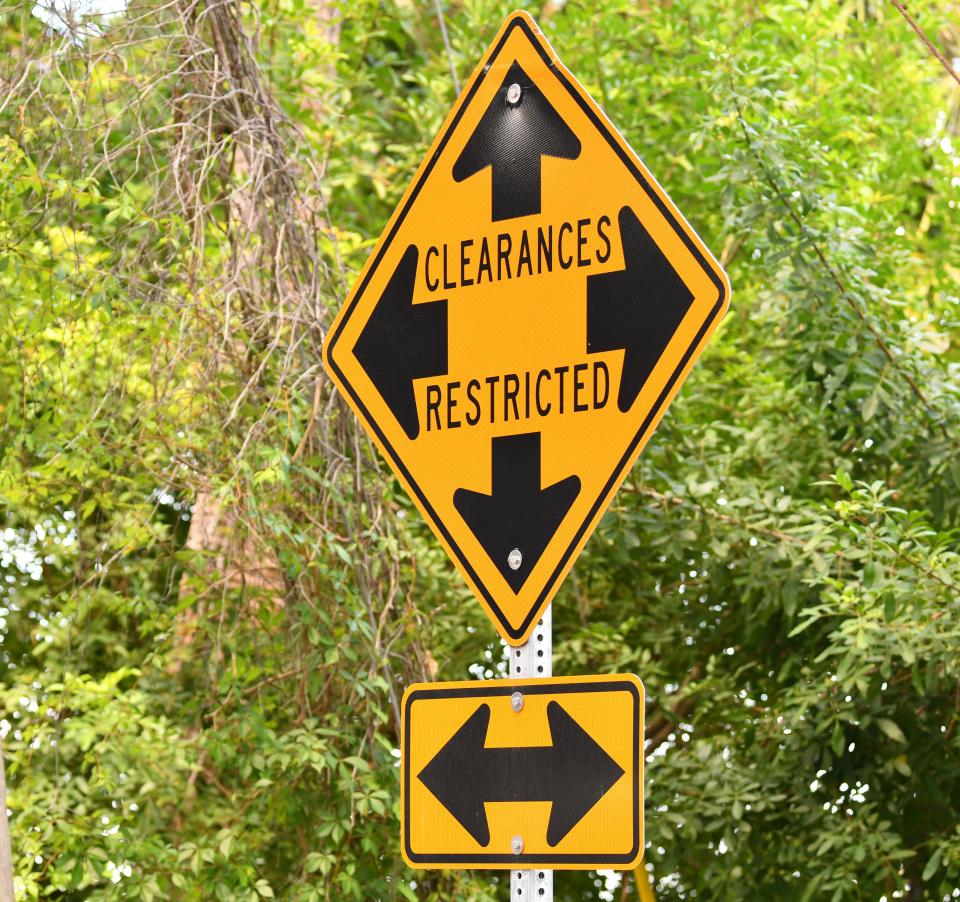 This road sign warns motorists of the low clearance along Rockledge Drive.