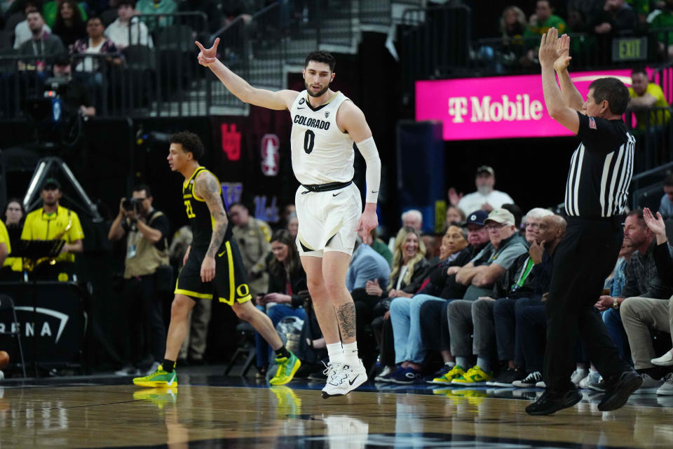 Colorado Buffaloes guard Luke O'Brien (0) gestures after a three point basket against the Oregon Ducks in the first half of the Pac-12 Championship game at T-Mobile Arena on March 16 in Las Vegas.