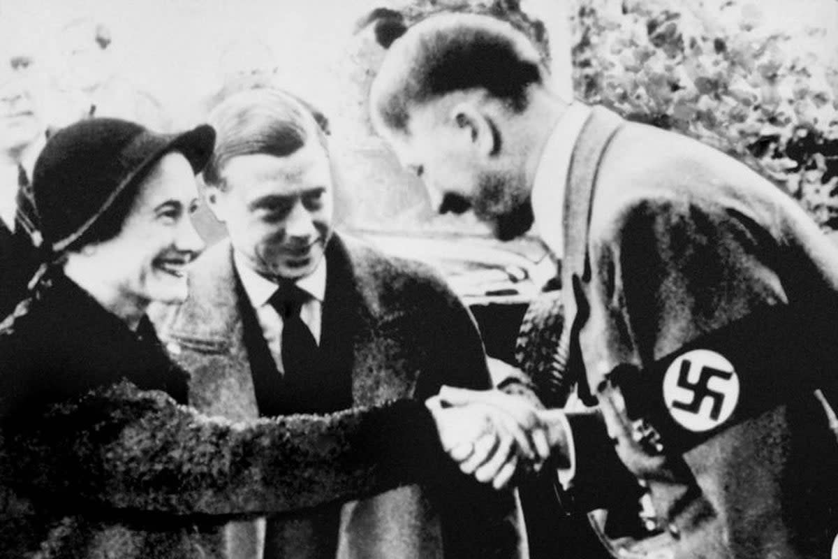 1937: The Duke and Duchess of Windsor meeting with German leader Adolf Hitler in Munich (PA)