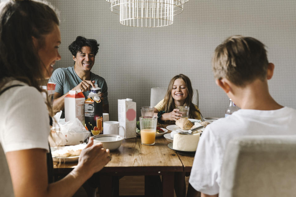 a family eating breakfast together