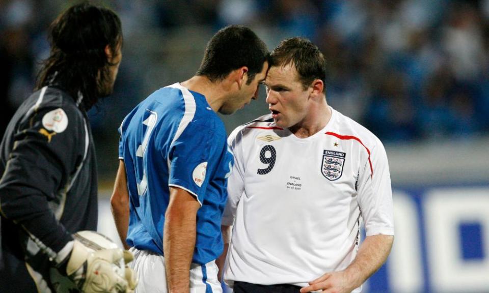 Wayne Rooney argues with Tal Ben Haim during England’s Euro 2008 qualifier in Israel