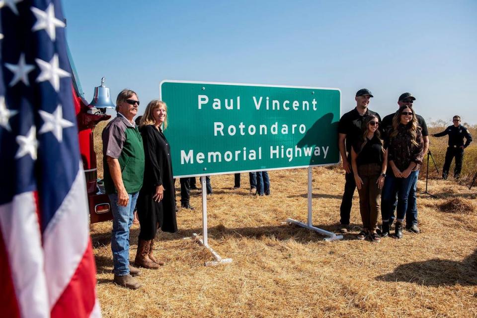 A ceremony is held to dedicate a section of Highway 140 near Gustine, the Paul Vincent Rotondaro Memorial Highway in Merced County, Calif., on Monday, Sept. 18, 2023. Cal Fire Capt. Paul Rotondaro was killed in a traffic collision while on duty in Merced County on Oct. 2, 2019.