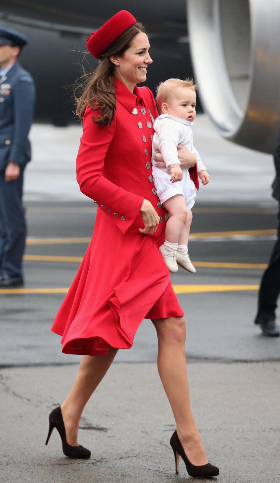 Catherine, Duchess of Cambridge and Prince George of Cambridge arrive at Wellington Military Terminal on an RNZAF 757 from Sydney on April 7, 2014 in Wellington, New Zealand