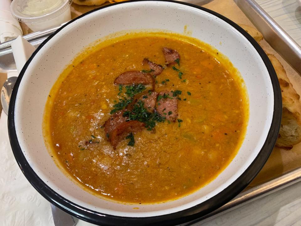 Hearty bean soup at Cafe Balkan is filled with sausages.