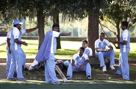 Players from a team of priests and seminarians attend a training session at the Maria Mater Ecclesiae's Catholic College in Rome October 22, 2013. REUTERS/Alessandro Bianchi