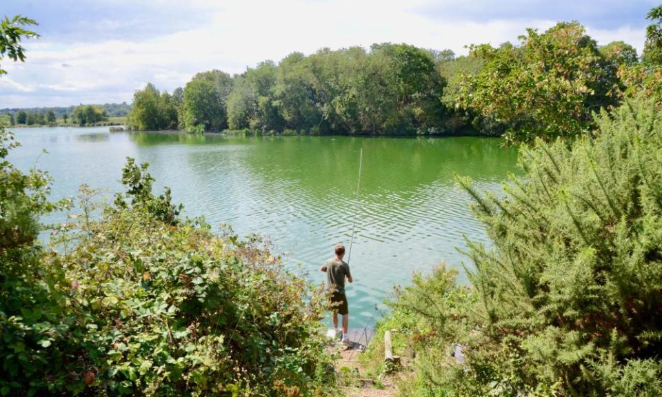 A fisherman at Walthamstow wetlands.