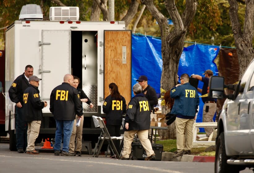 LONG BEACH CA MARCH 4, 2019 -- FBI agents continue their search Monday, March4, 2019, of the Long Beach home of Stephen Beal, who was arrested in connection with a fatal blast at an Aliso Viejo day spa that claimed the life of his ex-girlfriend and business partner last year. (Al Seib / Los Angeles Times)