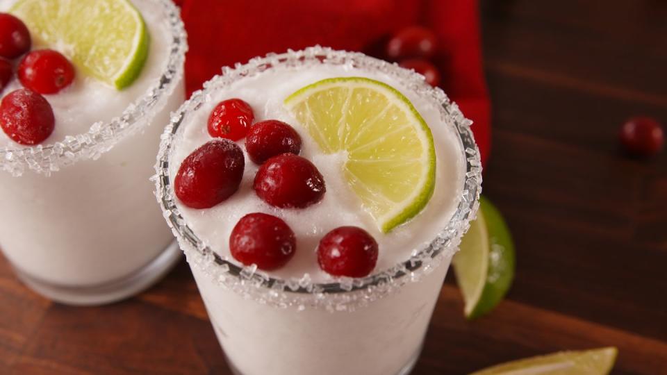 <p>Just because its cold out doesn't mean we can't enjoy tequila! The cranberry garnish is so festive it makes making a whole batch worth it!</p><p>Get the recipe from <a href="https://www.delish.com/cooking/recipe-ideas/recipes/a57117/white-christmas-margaritas-recipe/" rel="nofollow noopener" target="_blank" data-ylk="slk:Delish;elm:context_link;itc:0;sec:content-canvas" class="link ">Delish</a>.</p>