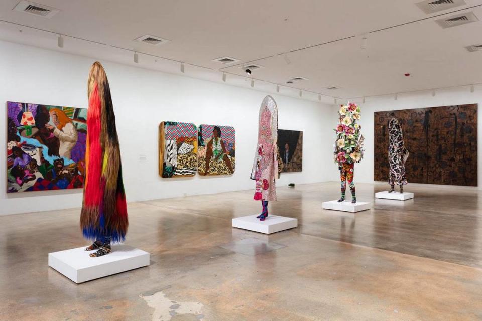 “Soundsuits” by artist Nick Cave and a diptych by Mickalene Thomas at the Rubell Museum.