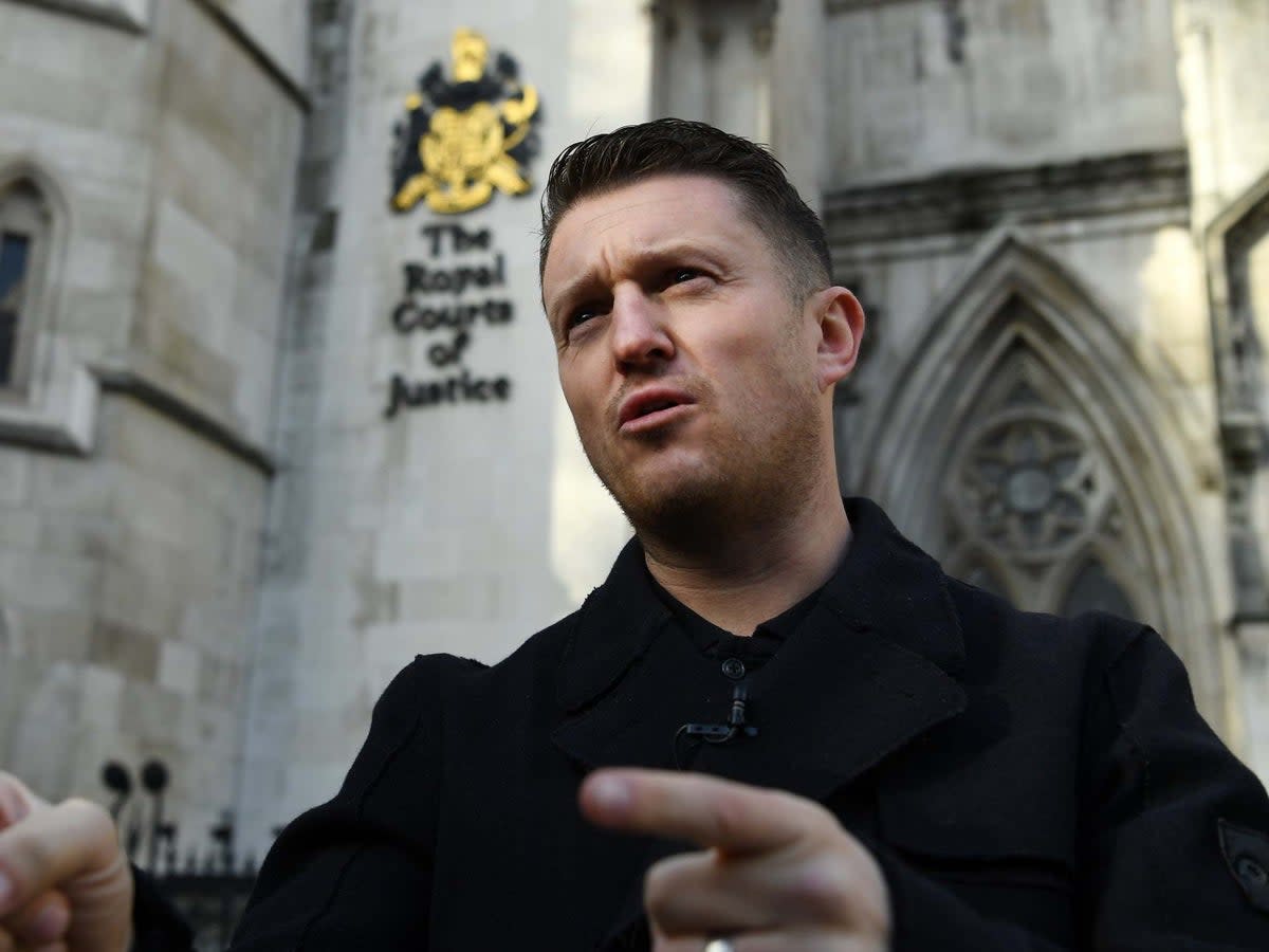 Tommy Robinson outside the High Court in London (EPA/Andy Rain)