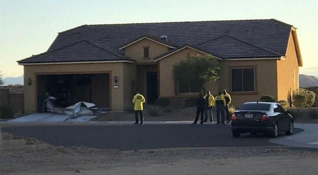 Police personnel stand outside the home of Stephen Paddock in Mesquite. Photo: Mesquite Police via AP