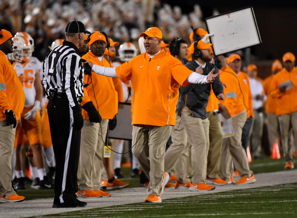 COLUMBIA, MISSOURI - NOVEMBER 23:  Head coach Jeremy Pruitt of the Tennessee Volunteers talks to an official during a game against the Missouri Tigers in the second quarter at Faurot Field/Memorial Stadium on November 23, 2019 in Columbia, Missouri. (Photo by Ed Zurga/Getty Images)