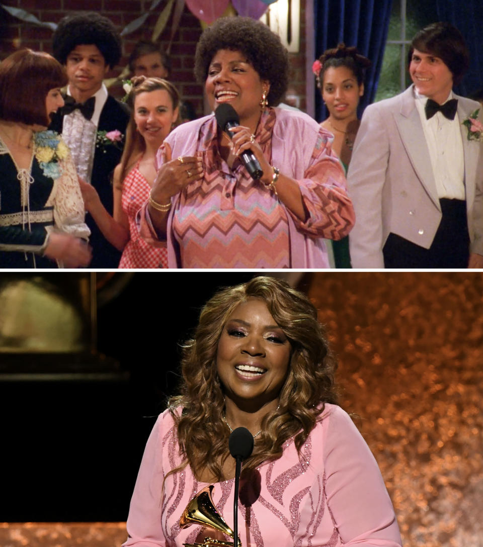 Gloria on the show holding a microphone and onstage holding an award