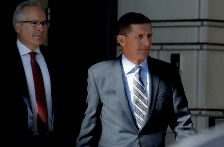 FILE PHOTO: Former U.S. National Security Adviser Michael Flynn departs after a plea hearing at U.S. District Court, in Washington, U.S., December 1, 2017. REUTERS/Joshua Roberts/File Photo