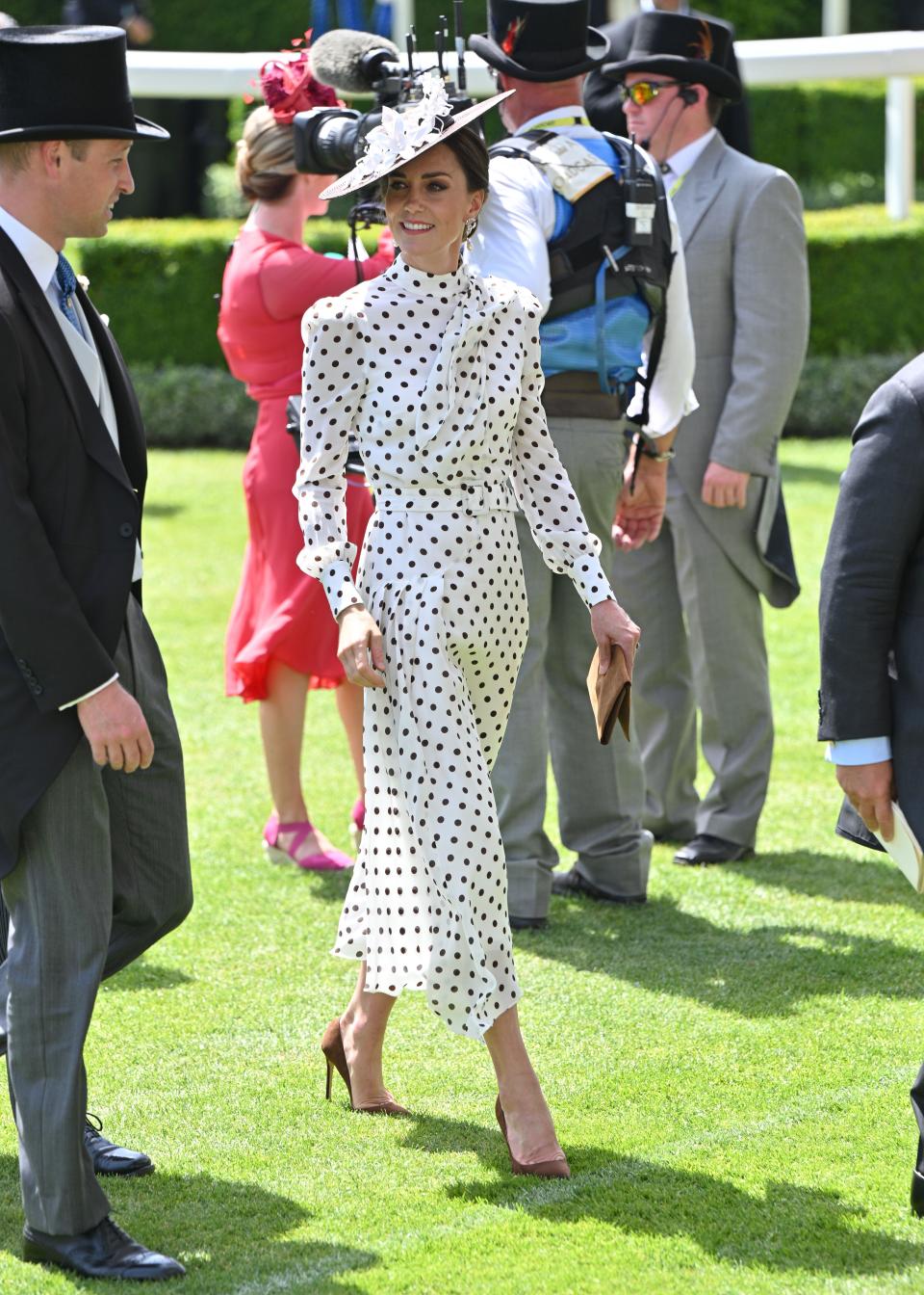 kate middleton in white and black long sleeve polka dot dress and hat, The Duke and Duchess of Cambridge at the Royal Ascot 2022 on June 17, 2022 in Ascot, England. (Photo by Samir Hussein/WireImage)