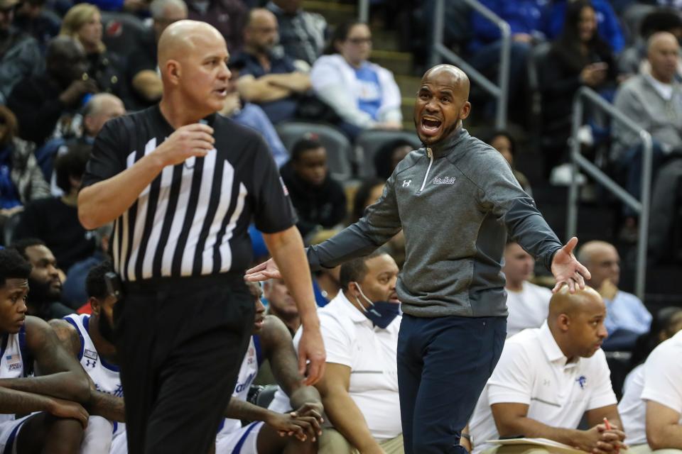 Seton Hall Pirates head coach Shaheen Holloway argues with an official in the first half against the Iowa Hawkeyes at Prudential Center.