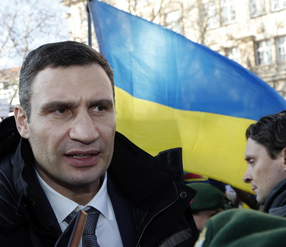Ukraine's opposition leader Vitali Klitschko joins a demonstration to support the opposition during the 50th Security Conference in Munich, Germany, Saturday, Feb. 1, 2014. The conference on security policy takes place from Jan. 31, 2014 to Feb 2, 2014. (AP Photo/Frank Augstein)