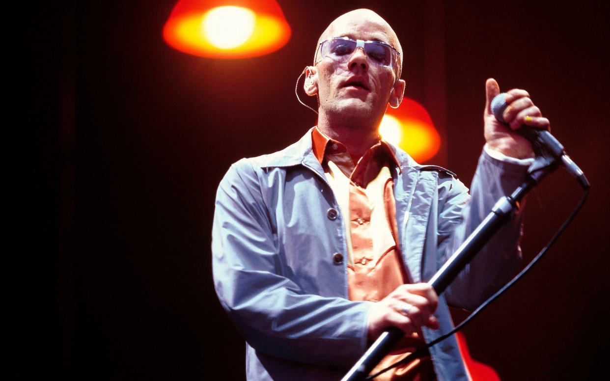 Michael Stipe performing in his band R.E.M  - This content is subject to copyright.