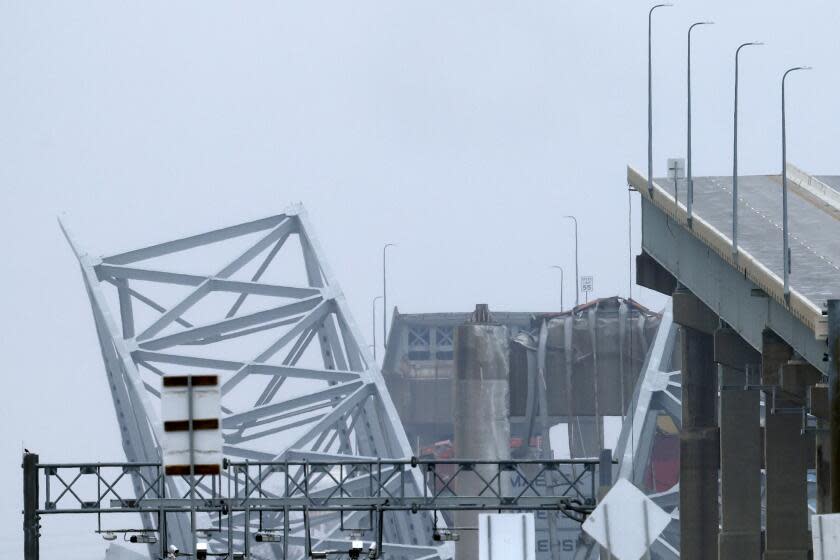 The collapsed Francis Scott Key Bridge is seen of the on ramp to the bridge on March 27, 2024 in Baltimore.