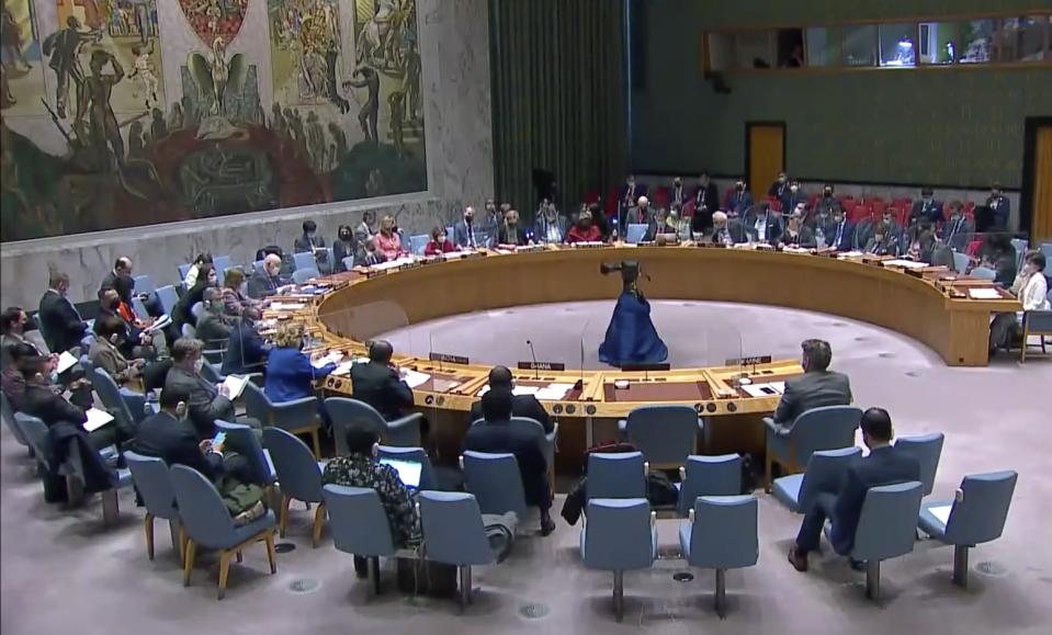 The United Nations Security Council listens to comments during a meeting, Friday, March 11, 2022, at UN headquarters. The Russian request for the Security Council meeting followed a U.S. rejection of Russian accusations that Ukraine is operating chemical and biological labs with U.S. support. (UNTV via AP)