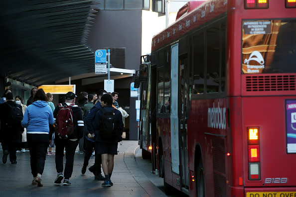 Commuters catch buses at Broadway in Sydney, Australia.