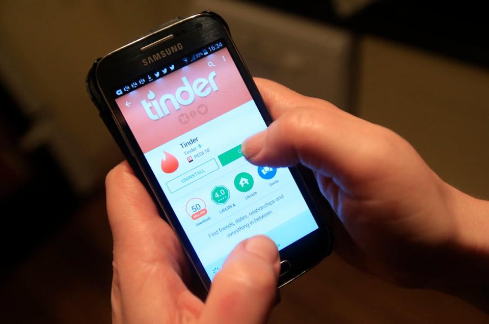 The Tinder app in use on a Samsung smartphone. (PA Archive)