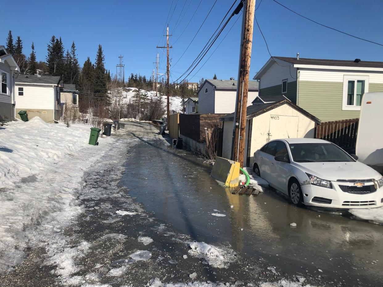 The City of Yellowknife is scheduling work this summer in a neighbourhood that has been experiencing repeated water infrastructure leaks and deteriorating road conditions. One local resident worries that the work won't be enough to solve the problems. (Luke Carroll/CBC - image credit)