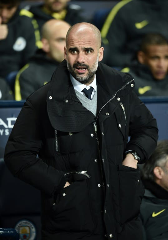 Manchester City's Pep Guardiola watches his players from the touchline on March 1, 2017