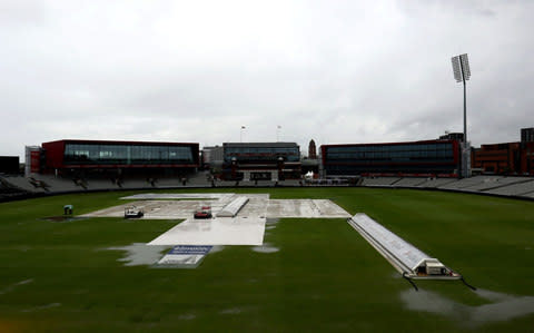 Rain on the outfield at Old Trafford - Credit: PA