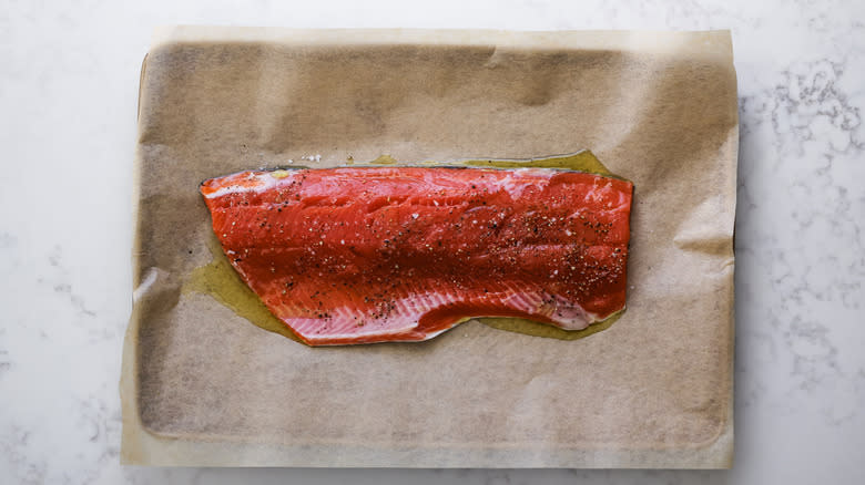 oiled salmon on brown paper