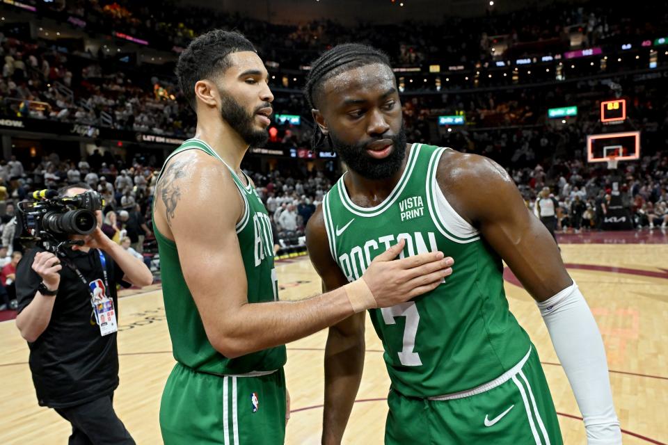 CLEVELAND, OHIO - MAY 13: (L-R) Jayson Tatum #0 of the Boston Celtics and Jaylen Brown #7 of the Boston Celtics celebrate after Game Four of the Eastern Conference Second Round Playoffs at Rocket Mortgage Fieldhouse on May 13, 2024 in Cleveland, Ohio. NOTE TO USER: User expressly acknowledges and agrees that, by downloading and or using this photograph, User is consenting to the terms and conditions of the Getty Images License Agreement. (Photo by Nick Cammett/Getty Images)