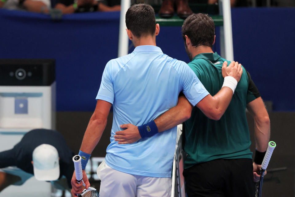 Novak Djokovic, pictured here embracing Pablo Andujar after their match at the Tel Aviv Open.