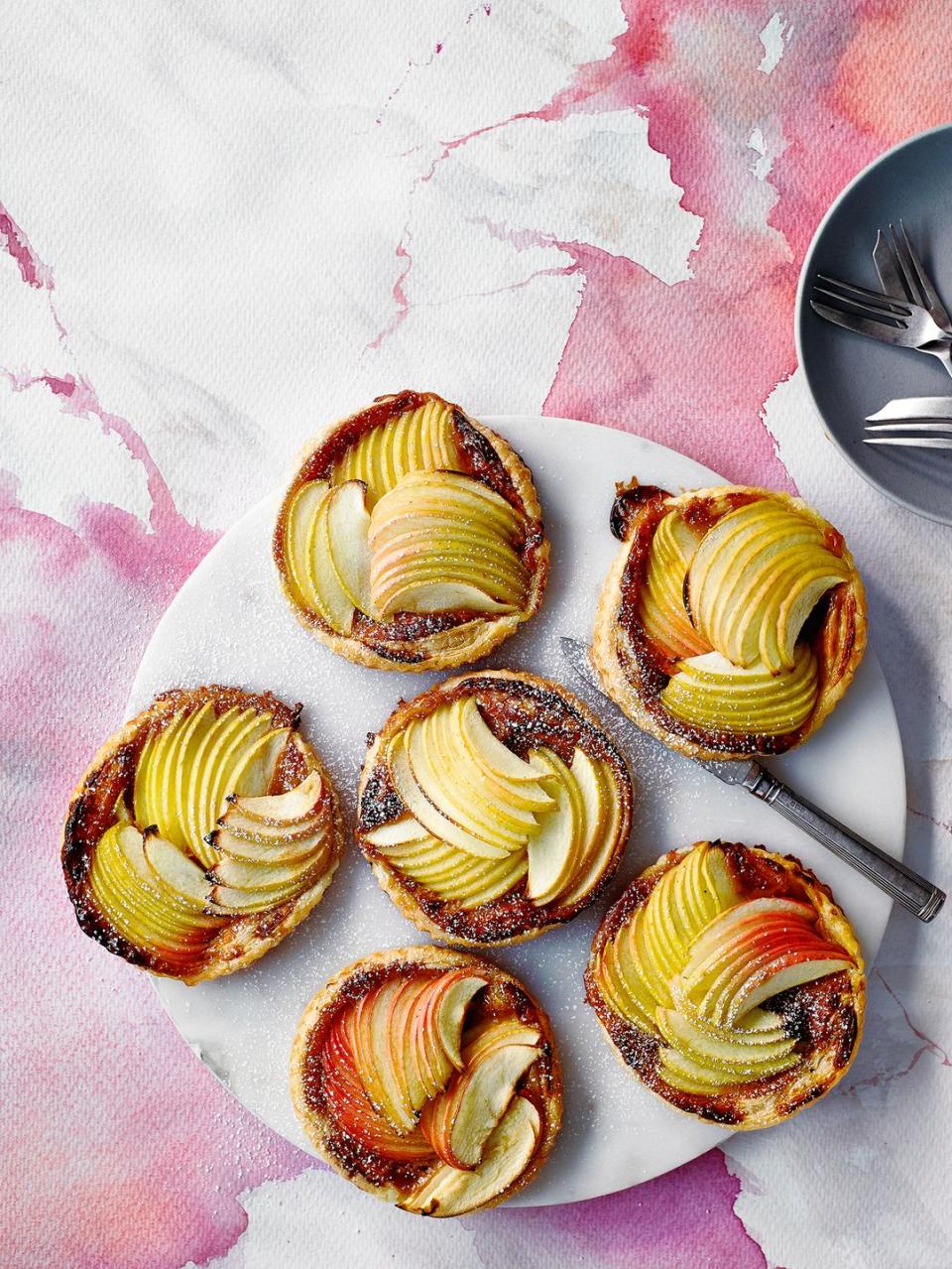 <p>So delicious and impressive, your guests will never know you took shortcuts! These taste great with a ball of vanilla ice cream or some pouring cream.</p><p><strong>Recipe: <a href="https://www.goodhousekeeping.com/uk/food/recipes/a26943008/easy-apple-tart/" rel="nofollow noopener" target="_blank" data-ylk="slk:Easy apple tarts;elm:context_link;itc:0;sec:content-canvas" class="link ">Easy apple tarts</a></strong></p>