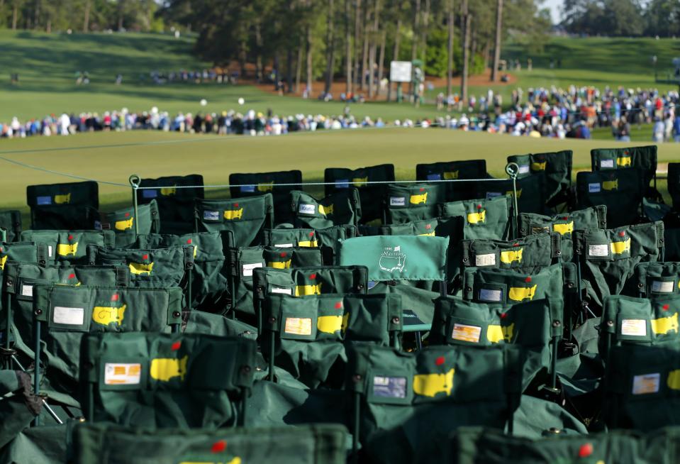 Masters chairs are arranged around the seventh green during the second round of the Masters golf tournament at the Augusta National Golf Club in Augusta, Georgia April 11, 2014. REUTERS/Mike Blake (UNITED STATES - Tags: SPORT GOLF)