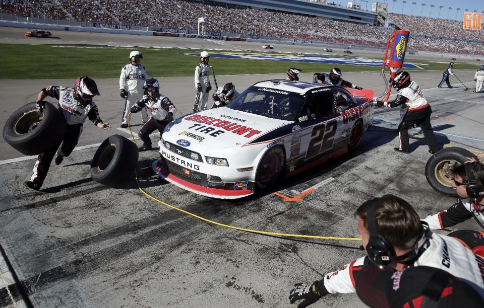 Brad Keselowski (22) pits during the NASCAR Nationwide Series auto race Saturday, March 8, 2014, in Las Vegas. Keselowski won the race. (AP Photo/Isaac Brekken)