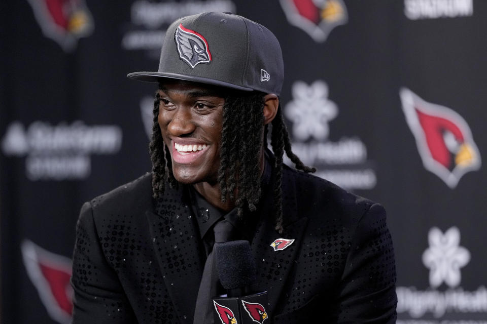 Arizona Cardinals first round draft pick Marvin Harrison Jr. speaks at an NFL football press conference, Friday, April 26, 2024, at the teams' facility in Tempe, Ariz. (AP Photo/Matt York)