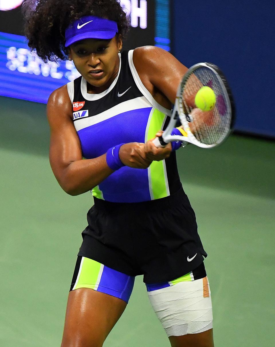 Naomi Osaka advanced to the U.S. Open semifinals by beating Shelby Rogers in straight sets.