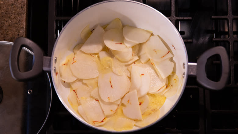 turnips and milk in saucepan
