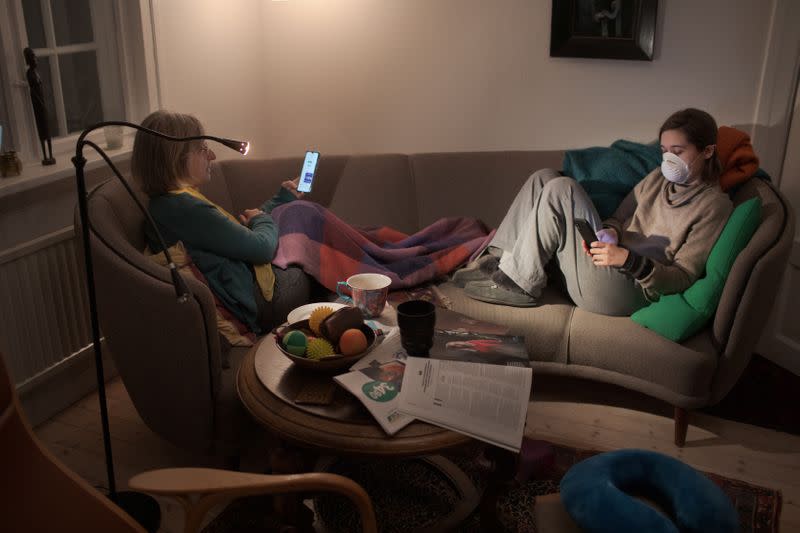 The Wider Image: Quarantine millennials face bedtimes and old rules as they move home