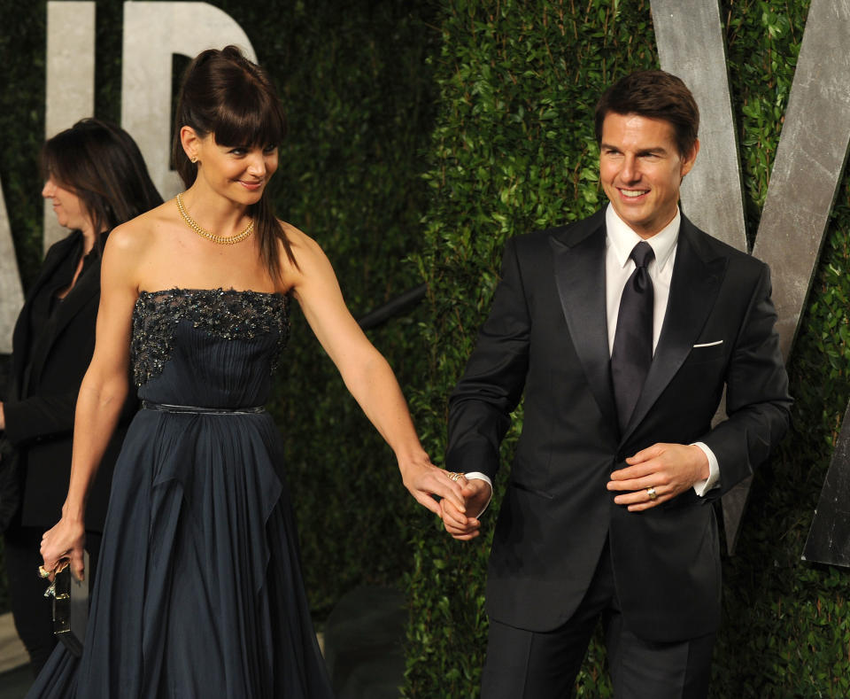 WEST HOLLYWOOD, CA - FEBRUARY 26:  Actors Katie Holmes and Tom Cruise arrive at the 2012 Vanity Fair Oscar Party hosted by Graydon Carter at Sunset Tower on February 26, 2012 in West Hollywood, California.  (Photo by Mark Sullivan/WireImage)