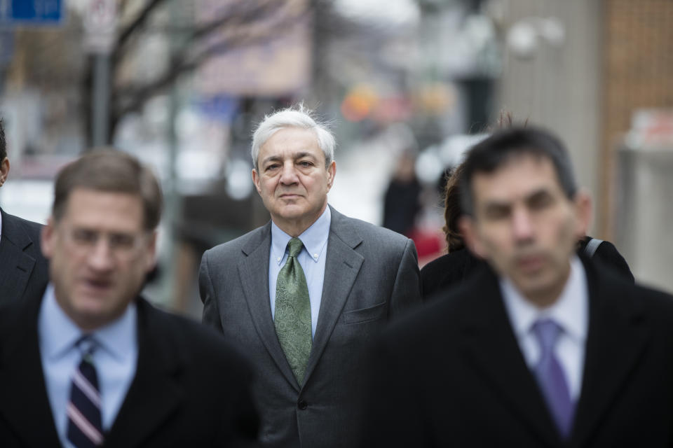 Former Penn State president Graham Spanier walks to the courthouse in Harrisburg, Pa., on March 24, 2017. (Matt Rourke / AP)