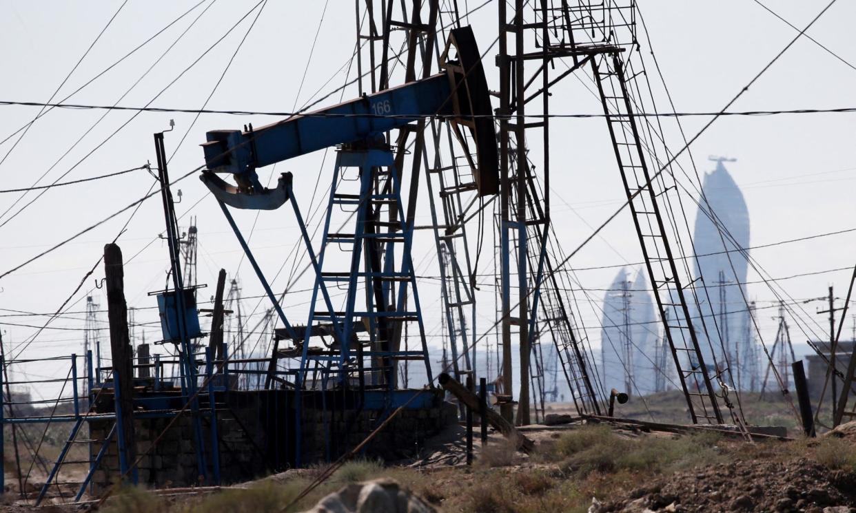 <span>An oilfield near Baku, Azerbaijan. Oil and gas make up more than 90% of the country’s exports.</span><span>Photograph: Grigory Dukor/Reuters</span>