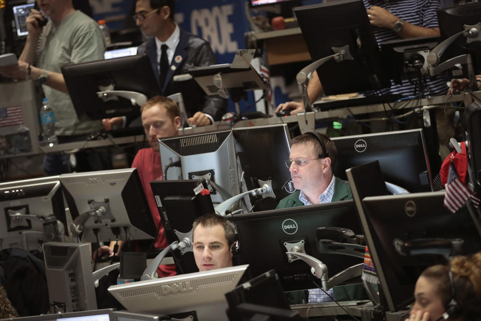 CHICAGO, IL - MARCH 03:  Traders in the Volatility Index (VIX) pit at the Chicago Board Options Exchange (CBOE) fill orders March 3, 2017 in Chicago, Illinois. While speaking in Chicago today Fed Chair Janet Yellen hinted that an interest rate hike will probably occur later this month.  (Photo by Scott Olson/Getty Images)